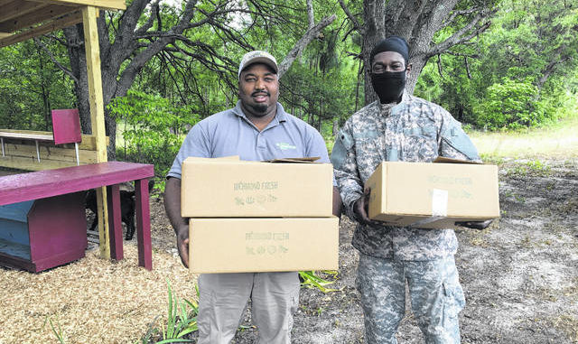  Photo courtesy of Paige Burns Clark Richmond Fresh boxes delivered to the Ellerbe Grove Community. 