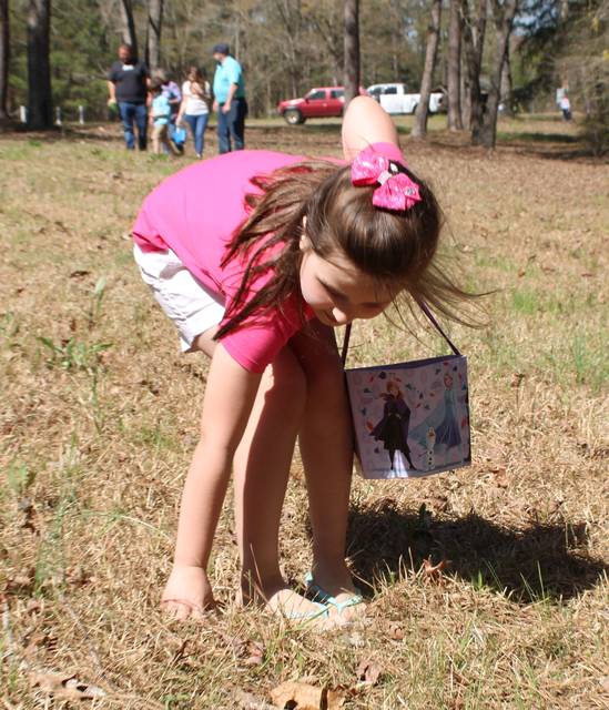 <p>Gavin Stone | Daily Journal</p> <p>Patience Oxendine picks up an Easter egg.</p>