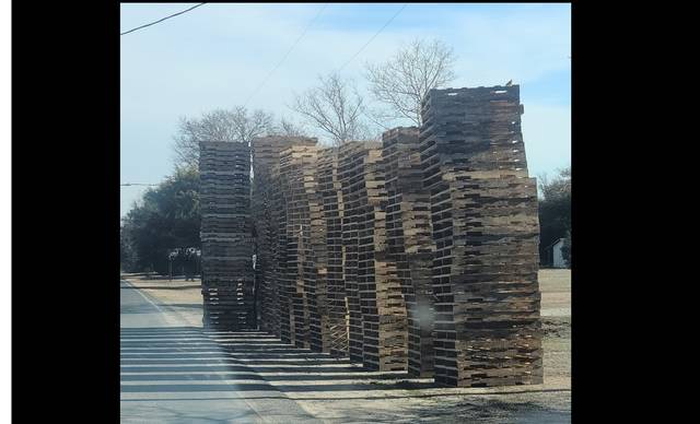 Daily Journal file photo Norman residents have said that the pallets have been dangerously close to the road and have been stacked 40 high.
