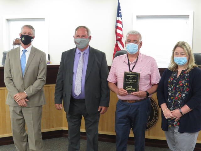 
			
				                                From left to right - Superintendent Dr. Jeff Maples, chairman Wiley Mabe, Dr. Tommy Jarrell, and Dr. Wendy Jordan. Dr. Tommy Jarrell will be retiring at the end of this month.
 
			
		