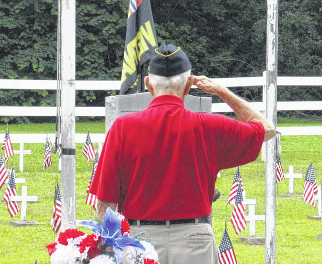 
			
				                                Daily Journal file photo
                                A local veteran honors fallen soldiers during the 2020 Memorial Day Ceremony at Richmond County Veterans Memorial Park.
 
			
		