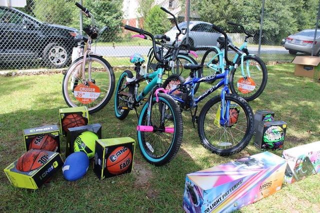 <p>Some of the prizes that were awarded on Saturday, which include basketballs and footballs, bikes and scooters.</p> <p>Gavin Stone | Daily Journal</p>