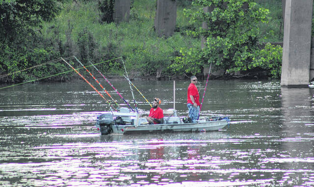  Daily Journal file photo Fisherman hunt for catfish in the Pee Dee River. 