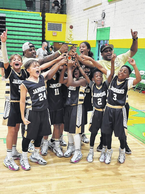 Richmond Jammers 10U basketball team celebrates winning a home tournament, hosted by Taneika Reader.
                                 Photo courtesy of Nikki Wells-Smith