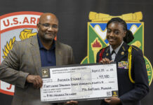 
			
				                                Lt. Col. (Ret) Anthony Watson, Recruiting Operations Officer, South Carolina State University, holds a ceremonial check with Richmond Senior High School JROTC Cadet Andrea Ellerbe during her ROTC scholarship signing day with South Carolina State University on April 25, 2023.
                                 Mark Bell | For the Daily Journal

			
		